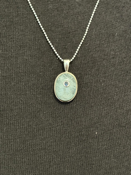 Aquamarine with sapphire