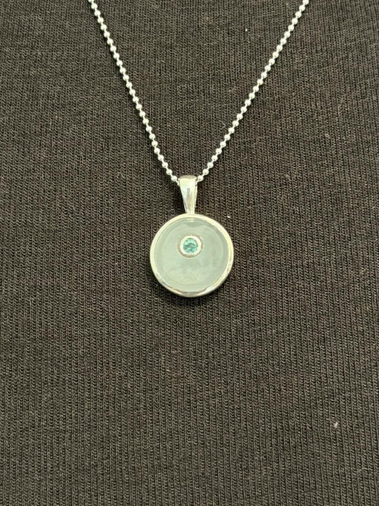 Moonstone with emerald