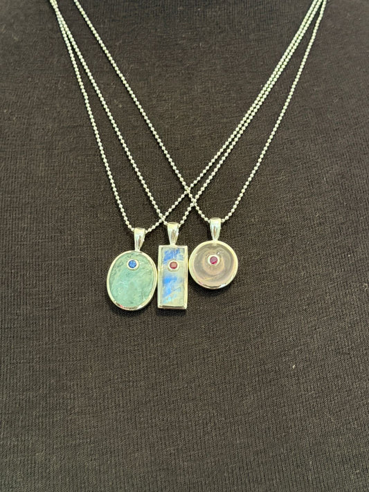 Moonstone with ruby