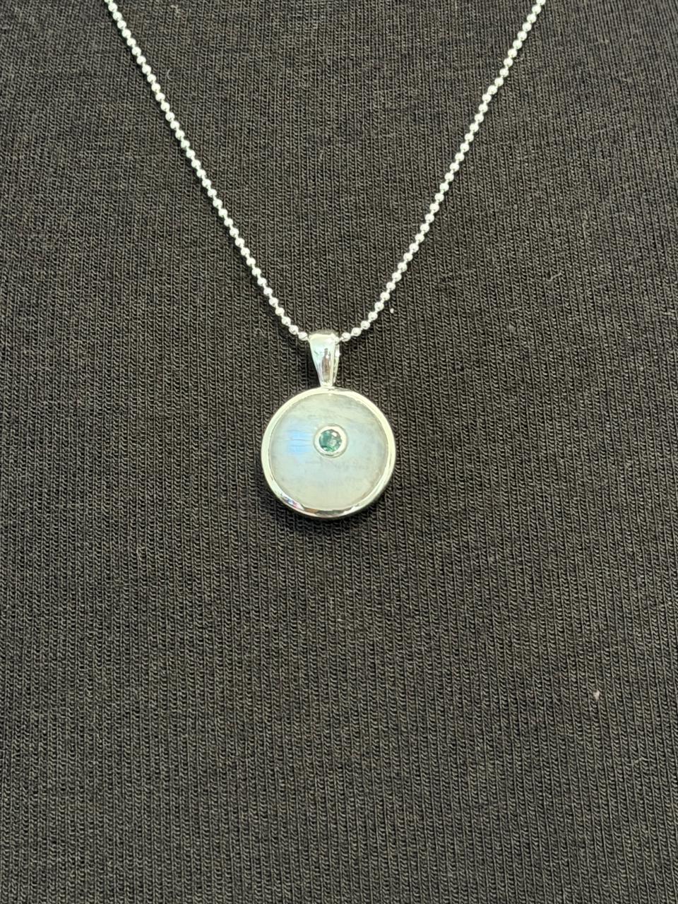 Moonstone with emerald