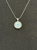 Moonstone with emerald