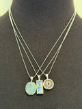 Moonstone with emerald