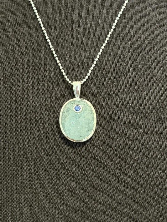 Aquamarine with sapphire